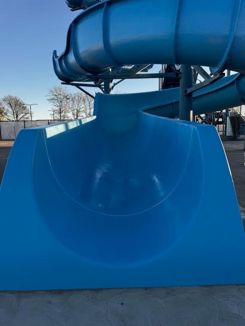 Slide exit with a fresh, glossy blue gelcoat interior