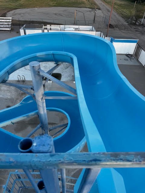 View from the top of the tower down the refinished blue slide