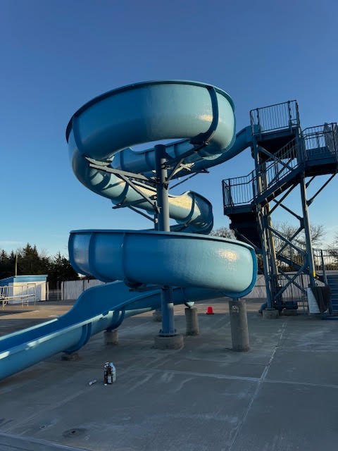 Repainted spiral slide and stair tower at the Burlington pool