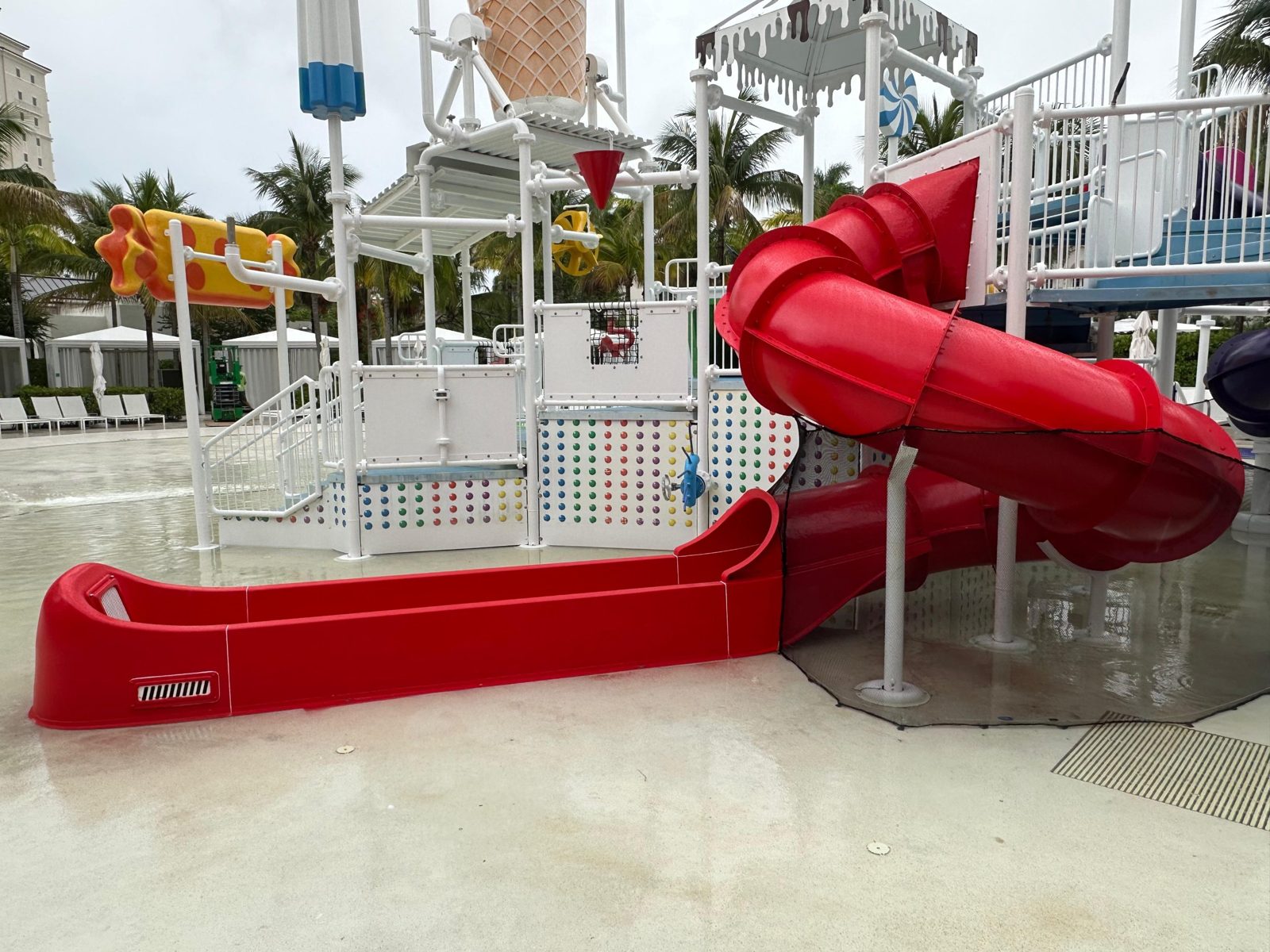 Finished red tube slide and runout in the kids area