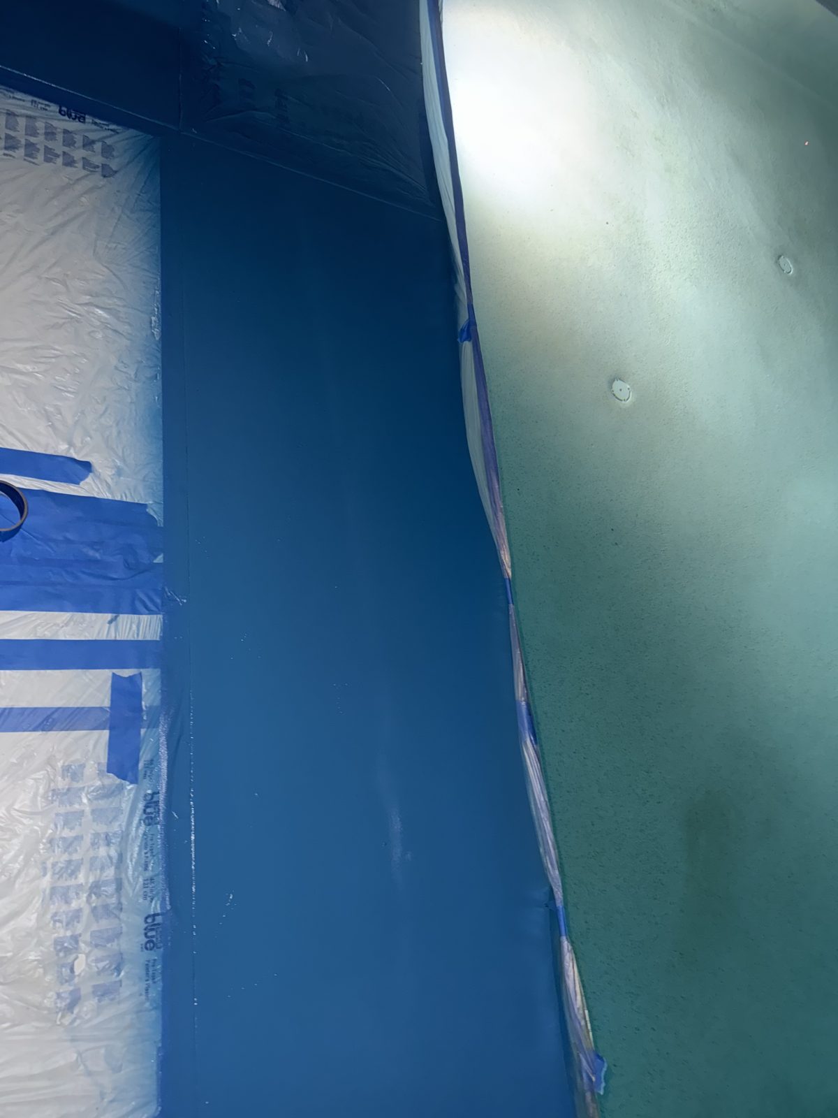 Freshly coated blue slide section with the masking still in place